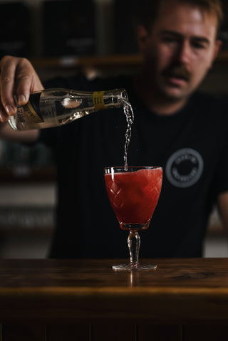Top cocktail with toninc water