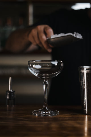 Breakfast Martini glass filled with ice
