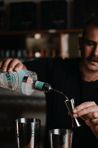 Delightful Dry Gin in actioned being poured into a measurer