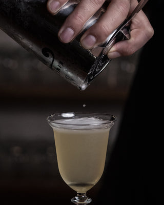 Golden Bay Glow pouring into goblet glass