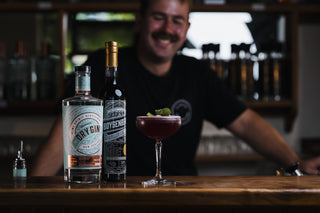 Motupipi Martini with Delightful and Boysenberry Liqueur bottles