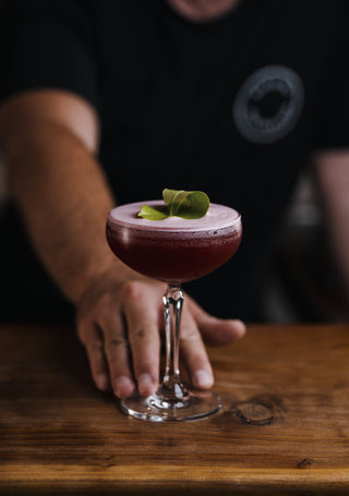 Motupipi Martini passed across the bar towards you