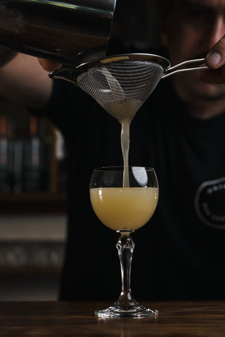 Petite Aimer pouring from a height