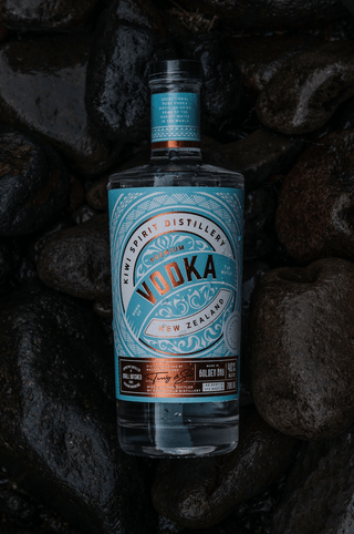 Premium New Zealand Vodka placed on river rocks