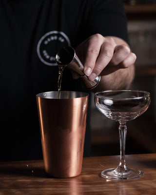 Twisted Whiskey Sour jigger poured into shaker