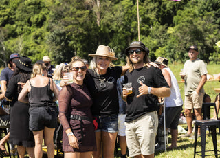 Cheers from the Kiwi Spirit Summer Festival, the team enjoying a drink in the sun