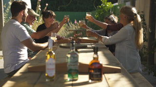 The Kiwi Spirits team cheers at our Cellar Door