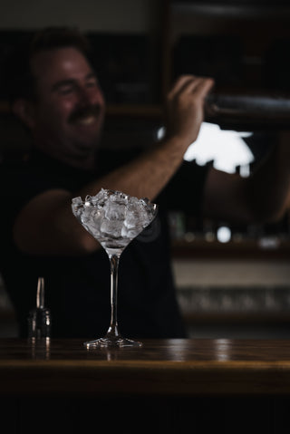 Clover Club martini glass filled with ice