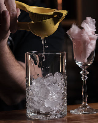 Lemon Juice into mixing glass