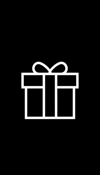 White gift box with a bow on a black background