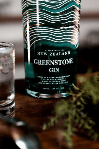 Greenstone New Zealand Gin close up of label with totara in foreground