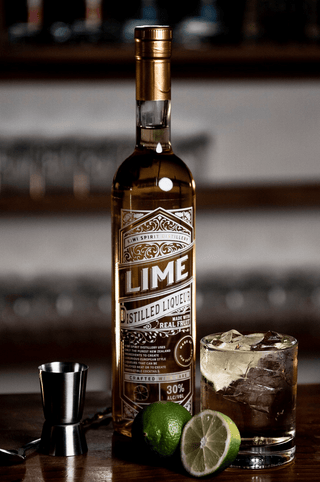 Lime Liqueur with tasty fresh limes and a lime and soda