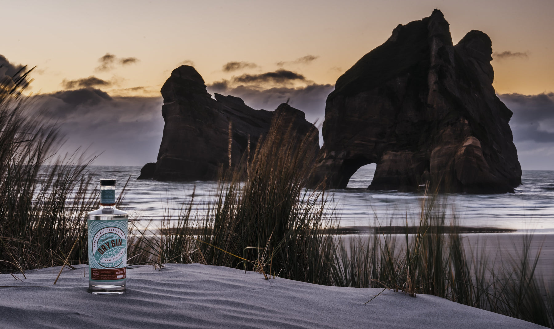 Delightful Dry Gin at beach on sunset